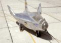 1280px-The_HL-10,_seen_here_parked_on_the_ramp_at_NASA's_Flight_Research_Center_in_1966,_had_a_radically_different_shape_from_that_of_the_M2-F2-F3_(ECN-1289)